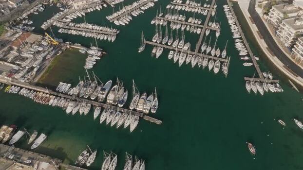 Aerial view of sailboats in the marina of Ortigia Italy. Aerial view of sailboats in the marina of Ortigia Italy.