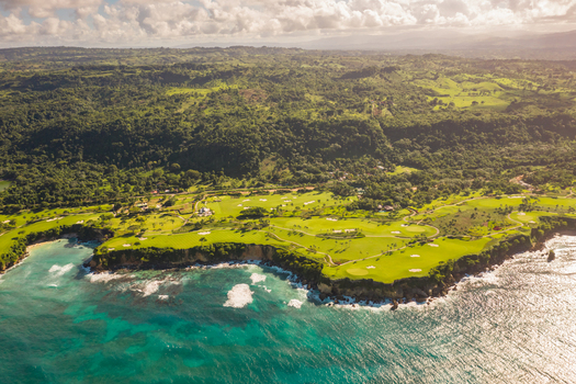 Aerial view of a luxury resort on a paradise island with golf club facing the ocean Rio San Juan Maria Trinidad Sanchez Dominican Republic.