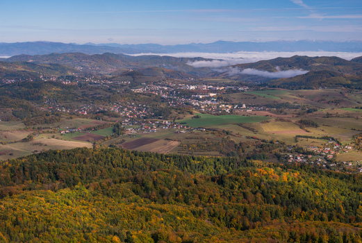 Aerial view of the landscape around Sitno mountain featuring dense autumn forests rolling hills and the village of Ilija Banska Bystrica Regio Slovakia. Aerial view of the landscape around Sitno mountain featuring dense autumn forests rolling hills and the village of Ilija Banska Bystrica Regio Slovakia.