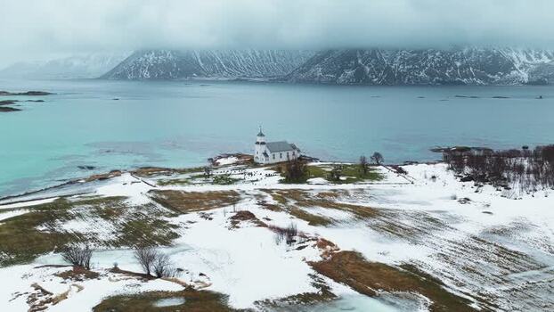 Aerial view of Gims&oslash;y Kirke in winter Norway.