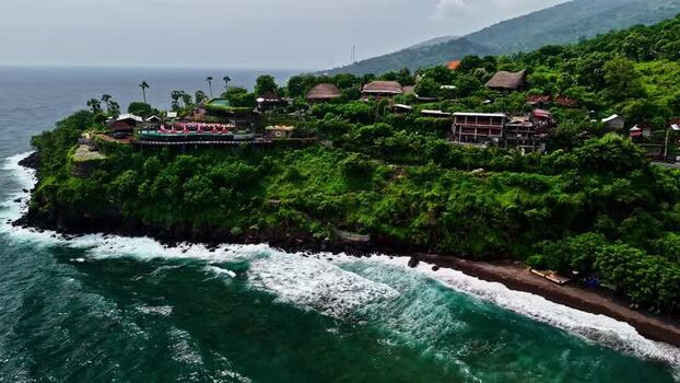 Aerial view of lush green cliffside in Bali Indonesia.