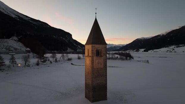 Aerial view of the sunken bell tower in Graun im Vinschgau Italy. Aerial view of the sunken bell tower in Graun im Vinschgau Italy.