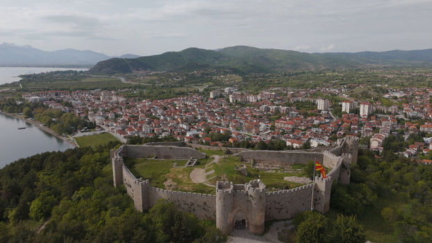Aerial view of Samuel s Fortress with historic stone walls and towers overlooking the city of Ohrid Lake Ohrid and surrounding mountains in Ohrid Municipality of Ohrid North Macedonia. Aerial view of Samuel s Fortress with historic stone walls and towers overlooking the city of Ohrid Lake Ohrid and surrounding mountains in Ohrid Municipality of Ohrid North Macedonia.