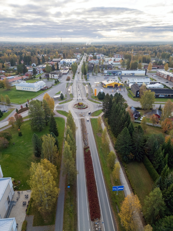 Muhos North Ostrobothnia Finland 22 September 2026 Aerial view of the roundabout in the town center surrounded by autumn trees buildings and roads under a cloudy sky.