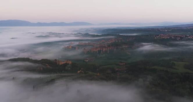 Aerial view of Balze del Valdarno rock formations in mist Italy. Aerial view of Balze del Valdarno rock formations in mist Italy.