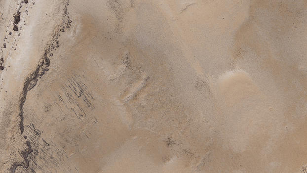 Aerial view of the intricate sand patterns and textures along the coastline in Denham Western Australia Australia. Aerial view of the intricate sand patterns and textures along the coastline in Denham Western Australia Australia.