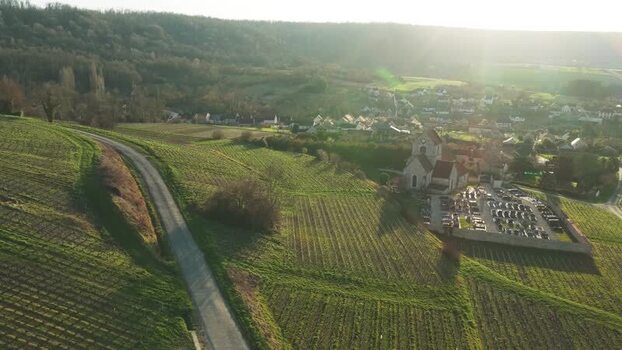 Aerial view of church and graveyard France.