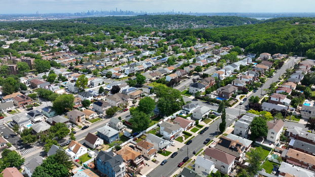 Aerial view of the Staten Island Greenbelt surrounded by residential houses and lush greenery in New York New York United States. Aerial view of the Staten Island Greenbelt surrounded by residential houses and lush greenery in New York New York United States.