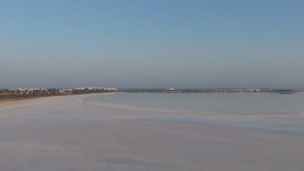 Aerial view of Larnaca Salt Lake and the city skyline Cyprus.