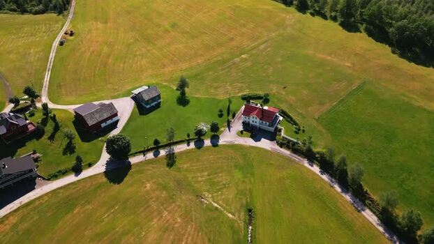 Aerial view of rural farmhouses in Klakegg Norway.