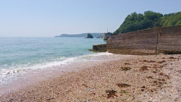 View of Charlestown beach and concrete sea wall United Kingdom. View of Charlestown beach and concrete sea wall United Kingdom.