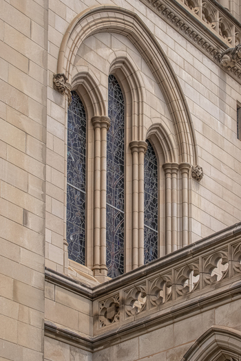 Washington District of Columbia United States 06 May 2025 View of the intricate Gothic architecture and stained glass windows of the Washington National Cathedral showcasing detailed stone masonry.