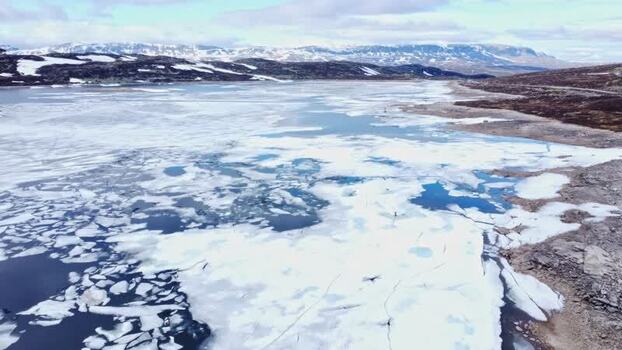 Aerial view of melting ice on Hardangervidda plateau Norway. Aerial view of melting ice on Hardangervidda plateau Norway.