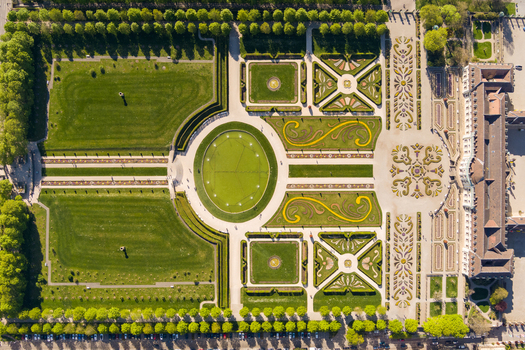 Aerial view of the baroque gardens of Ludwigsburg Palace with manicured lawns geometric flower beds and symmetrical hedges in Ludwigsburg Baden Wurttemberg Germany.