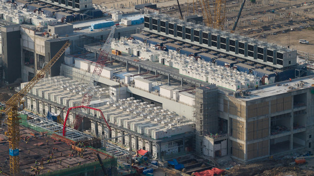 Aerial view of Bridge Data Center under construction with cooling units and cranes in Khlong Tamru Chon Buri Thailand. Aerial view of Bridge Data Center under construction with cooling units and cranes in Khlong Tamru Chon Buri Thailand.