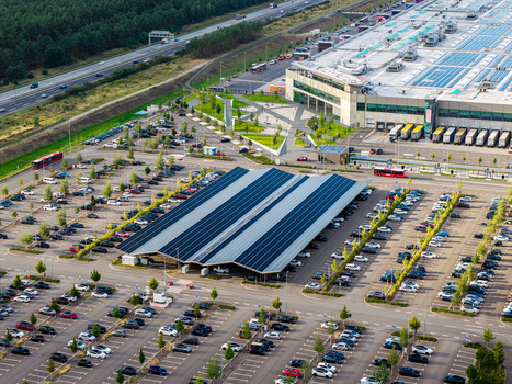 Grunheide Mark Brandenburg Germany 07 September 2026 Aerial view of Tesla Gigafactory Berlin Brandenburg with solar panel arrays on parking structures and factory buildings. Grunheide Mark Brandenburg Germany 07 September 2026 Aerial view of Tesla Gigafactory Berlin Brandenburg with solar panel arrays on parking structures and factory buildings.