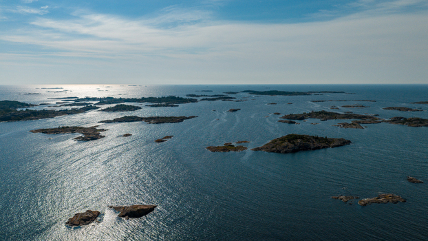 Aerial view of the rocky islands of Oro Fortress Island surrounded by the sparkling Baltic Sea in Oro Varsinais Suomi Finland. Aerial view of the rocky islands of Oro Fortress Island surrounded by the sparkling Baltic Sea in Oro Varsinais Suomi Finland.