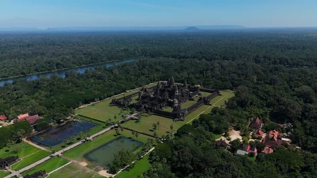 Aerial view of Angkor Wat temple complex in Cambodia. Aerial view of Angkor Wat temple complex in Cambodia.