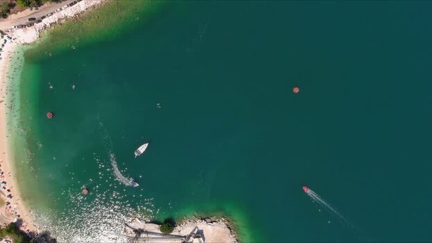 Aerial view of turquoise bay with boats in Thasos Greece. Aerial view of turquoise bay with boats in Thasos Greece.