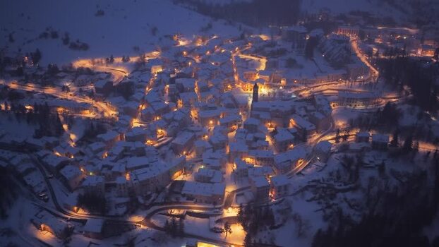 Aerial view of Rivisondoli at night in Italy.