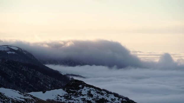 View of Balkan Mountains peaks above clouds in Lovech Bulgaria.