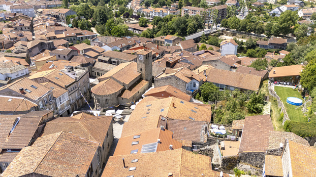 Aerial view of the historic town with traditional stone buildings terracotta rooftops and narrow streets in Allariz Province of Ourense Spain. Aerial view of the historic town with traditional stone buildings terracotta rooftops and narrow streets in Allariz Province of Ourense Spain.