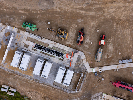 Aerial view of Zarnowiec Pumped Storage Power Station construction site with heavy machinery and industrial containers in Wejherowo County Pomeranian Voivodeship Poland.