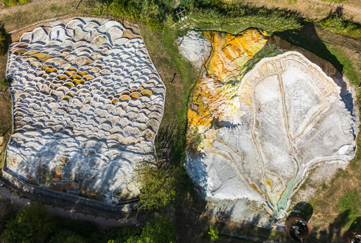 Aerial view of Egerszalok salt hill with thermal springs on sunny summer day Aerial view of Egerszalok salt hill with thermal springs on sunny summer day
