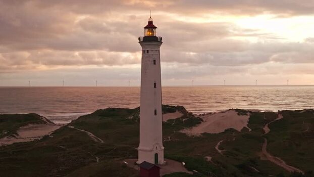 Aerial view of Lyngvig Lighthouse at sunset Denmark.