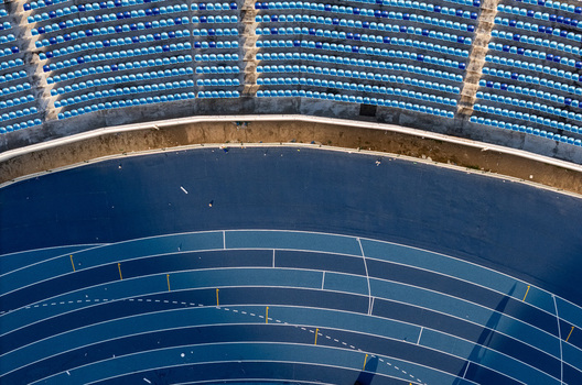 Aerial view of the blue running track and stadium seating in Santo Domingo Distrito Nacional Dominican Republic.