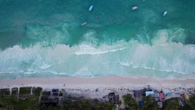 Aerial view of the turquoise coastline and beach in Malindi Kenya. Aerial view of the turquoise coastline and beach in Malindi Kenya.