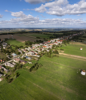 Aerial view of the historic Tesi Szelmalmok windmills surrounded by green fields and the village of Tes Hungary. Aerial view of the historic Tesi Szelmalmok windmills surrounded by green fields and the village of Tes Hungary.