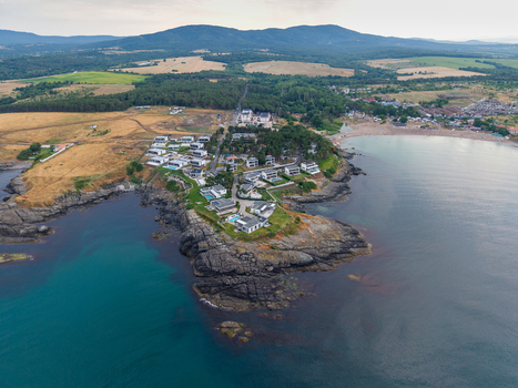 Aerial view of Arapya resort with modern villas swimming pools and sandy beach along the rocky coastline in Burgas Bulgaria. Aerial view of Arapya resort with modern villas swimming pools and sandy beach along the rocky coastline in Burgas Bulgaria.