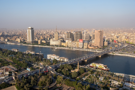 Cairo Egypt 19 October 2025 View of the Nile River reflecting the warm sunlight bridges bustling with traffic amidst the city s skyline. Cairo Egypt 19 October 2025 View of the Nile River reflecting the warm sunlight bridges bustling with traffic amidst the city s skyline.