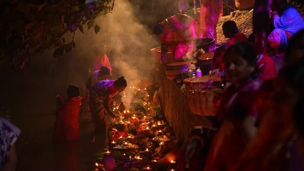 View of people performing religious rituals with oil lamps Bangladesh. View of people performing religious rituals with oil lamps Bangladesh.