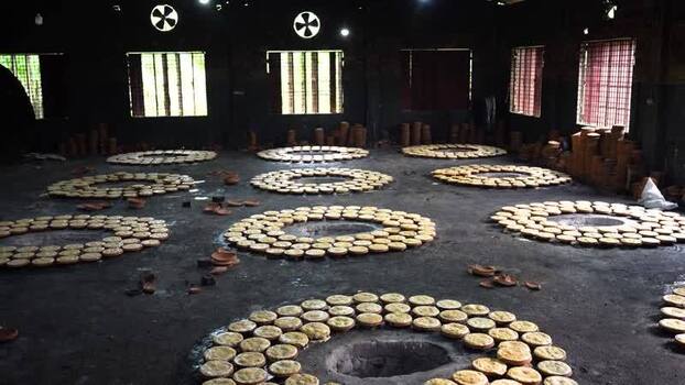 View of traditional clay pots arranged in circles Bangladesh. View of traditional clay pots arranged in circles Bangladesh.