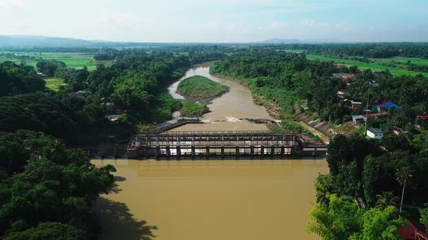 Aerial view of Jalaur Dam and surrounding river Philippines.