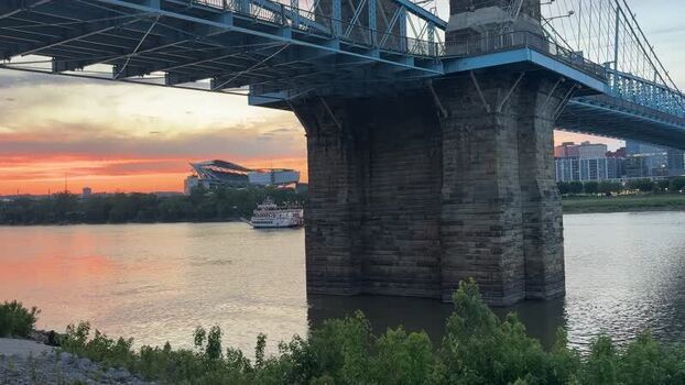 View of John A. Roebling Suspension Bridge at sunset United States.
