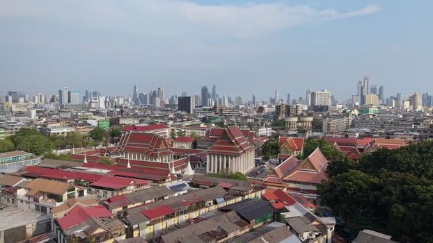 Aerial view of a Thai temple and city skyline Thailand.