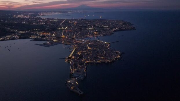 Aerial view of the Island of Ortigia and Syracuse at night Italy. Aerial view of the Island of Ortigia and Syracuse at night Italy.
