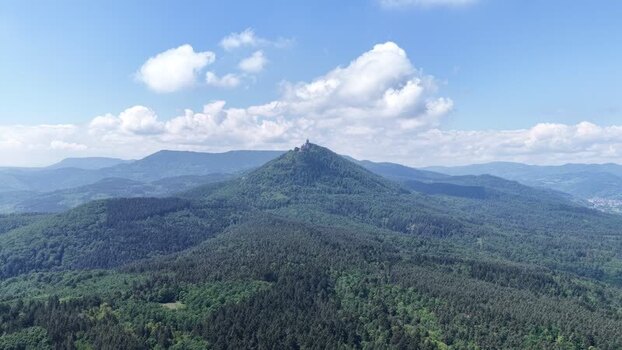 Aerial view of Haut Koenigsbourg Castle on a forested hill France.