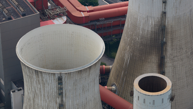 Aerial view of Kraftwerk Niederaussem showing large cooling towers and industrial infrastructure in Bergheim Nordrhein Westfalen Germany. Aerial view of Kraftwerk Niederaussem showing large cooling towers and industrial infrastructure in Bergheim Nordrhein Westfalen Germany.