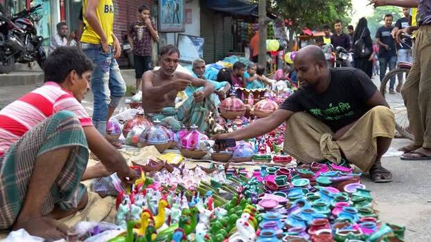 View of street vendors selling colorful clay toys Bangladesh. View of street vendors selling colorful clay toys Bangladesh.