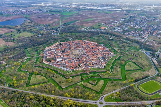 Aerial view of the octagonal fortress city with its star shaped fortifications a testament to military architecture Neuf Brisach Grand Est France.