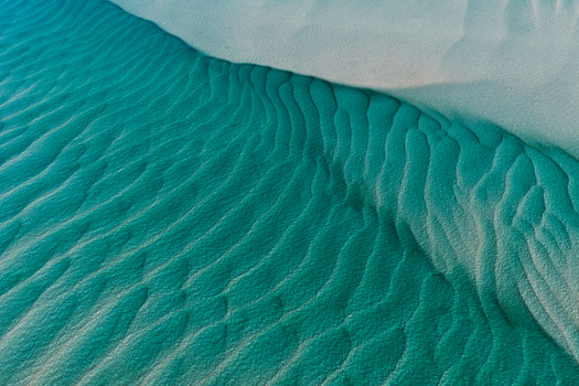 Aerial view of intricate sand ripples in shallow turquoise water at Amity Point Minjerribah North Stradbroke Island Moreton Bay Amity Point Queensland Australia. Aerial view of intricate sand ripples in shallow turquoise water at Amity Point Minjerribah North Stradbroke Island Moreton Bay Amity Point Queensland Australia.