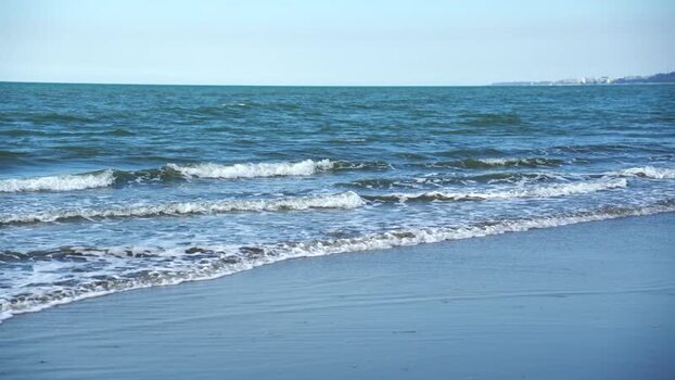 View of waves crashing on the sandy shore of Cox s Bazar Bangladesh.