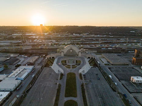 Aerial view of Union Terminal s grand facade and symmetrical plaza bathed in the warm glow of the setting sun Cincinnati Ohio United States. Aerial view of Union Terminal s grand facade and symmetrical plaza bathed in the warm glow of the setting sun Cincinnati Ohio United States.