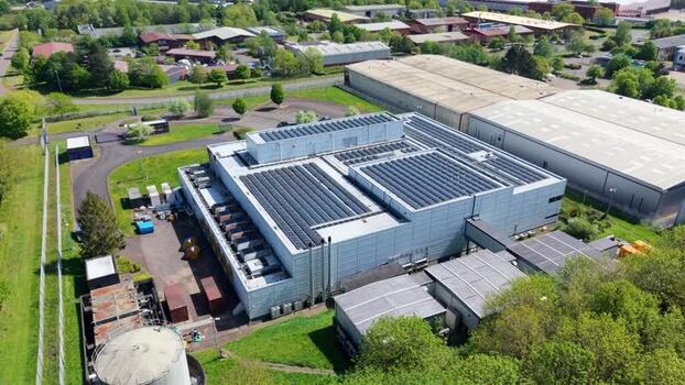 Aerial view of a modern data center with solar panels United Kingdom. Aerial view of a modern data center with solar panels United Kingdom.