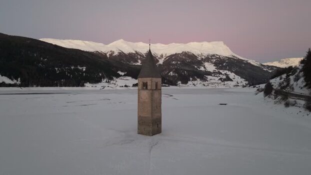 Aerial view of the sunken bell tower in Graun im Vinschgau Italy. Aerial view of the sunken bell tower in Graun im Vinschgau Italy.