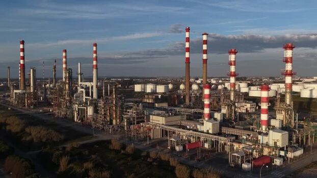 Aerial view of oil refinery industrial complex with chimneys Portugal.